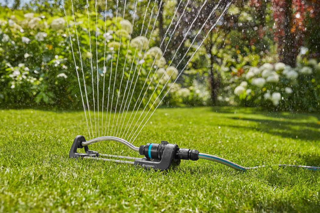 Gardena EcoLine Oscillating Sprinkler shown watering a lawn